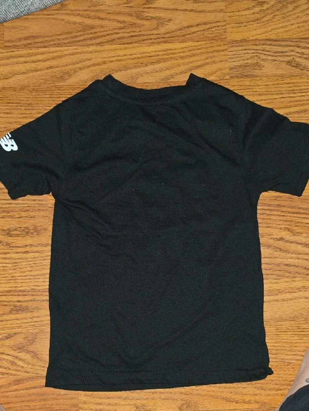 New Balance Black Tee with White Basketball Graphic